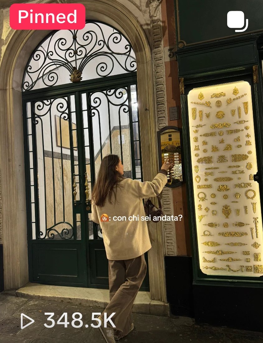 TikTok video frame: girl ringing a door buzzer in Genova at night